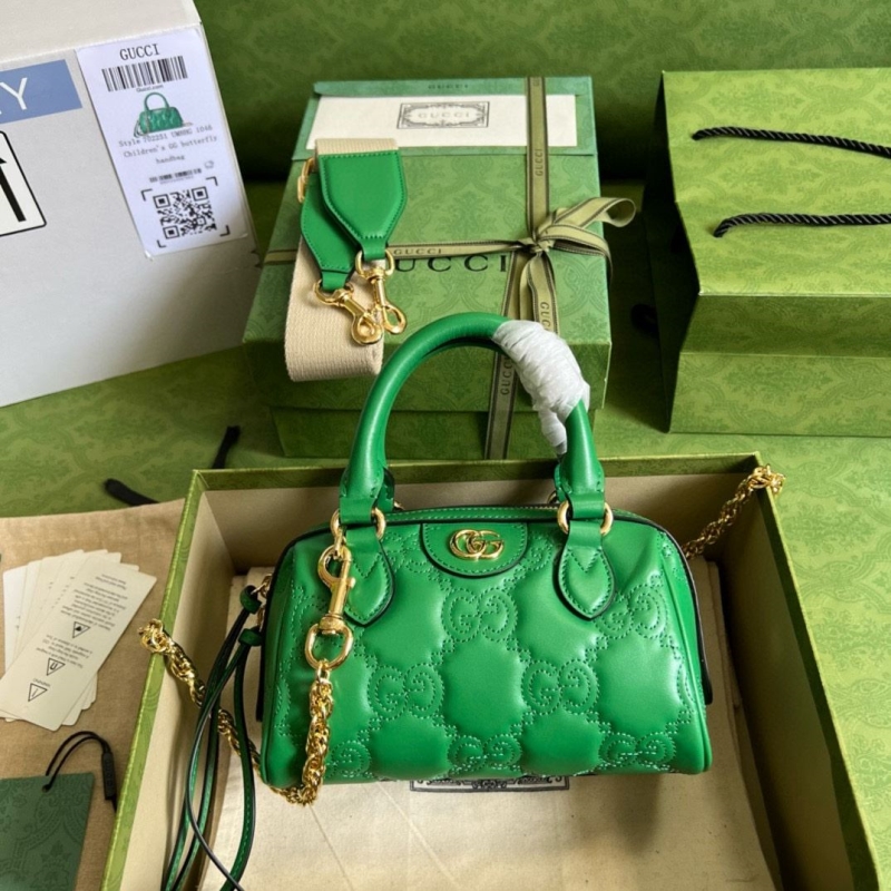 G*u*i top handle bags